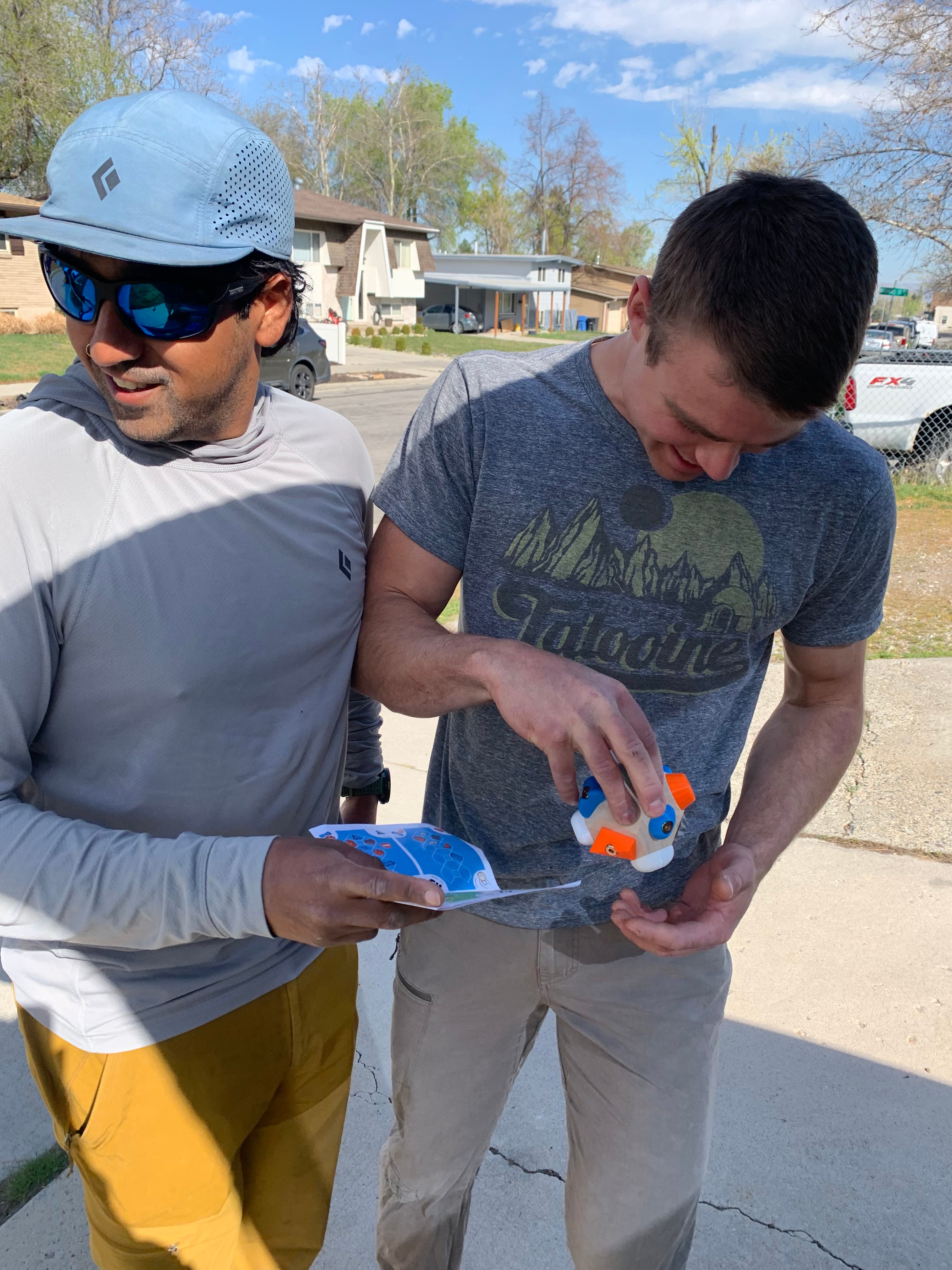 Trying a "fingery" boulder with Evan, Morgan and Meredith.